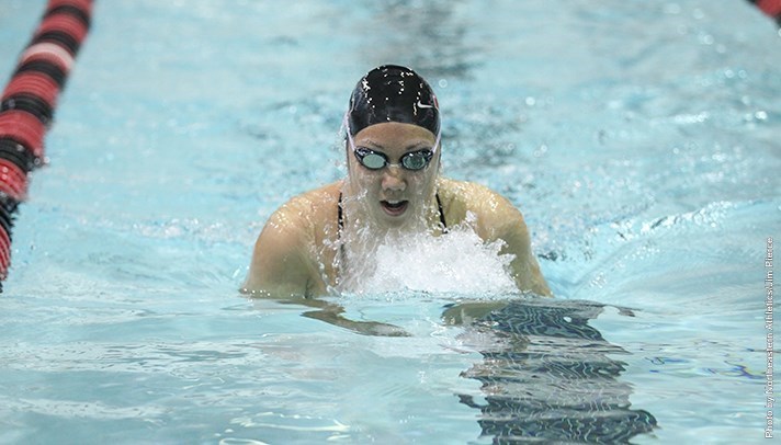 Swimming and diving team breaks records at Rutgers