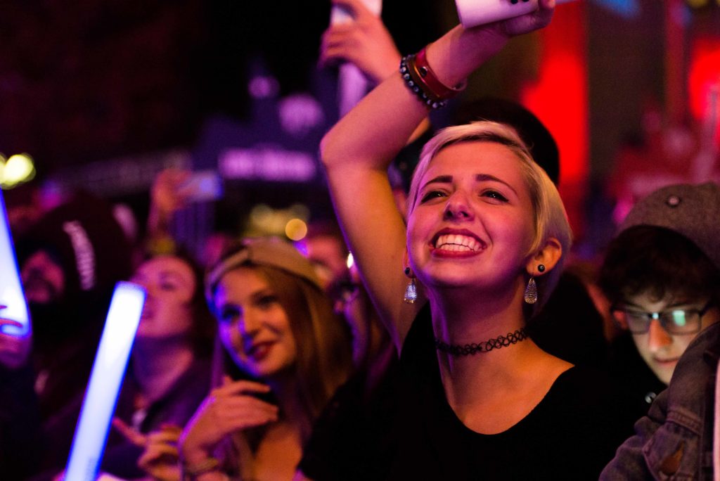 Boston University sophomore Abby Kass, 19, watches in excitement for The Avett Brothers at Boston Calling.