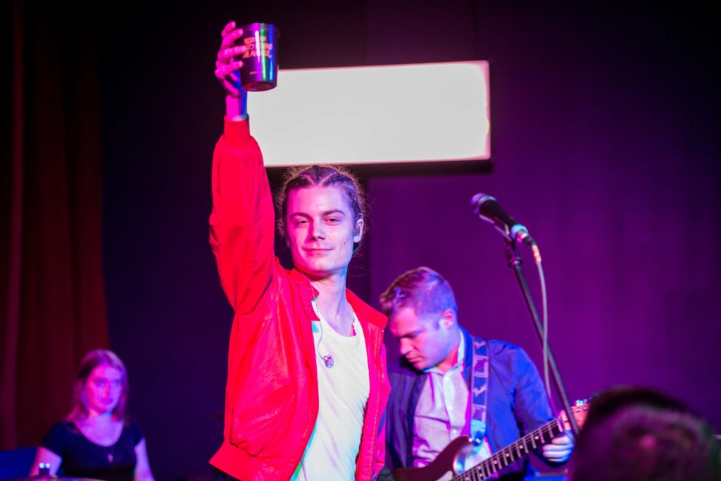 BØRNS raises his cup before his concert begins at afterHOURS on Wednesday, Sept. 9.