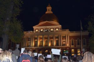 Citizens, students protest Baker’s refugee position