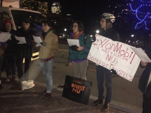 Students protest for divestment outside Aoun’s holiday party