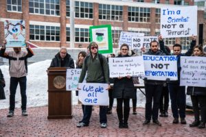 Students, faculty protest immigration ban on Centennial Common
