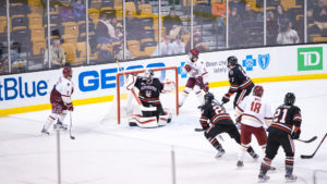 Husky puck takes bronze in tourney