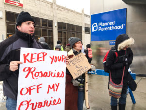 Abortion activists clash outside Planned Parenthood