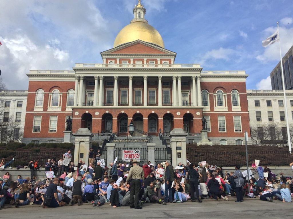 Boston health care workers, activists protest ACA repeal on Beacon Hill