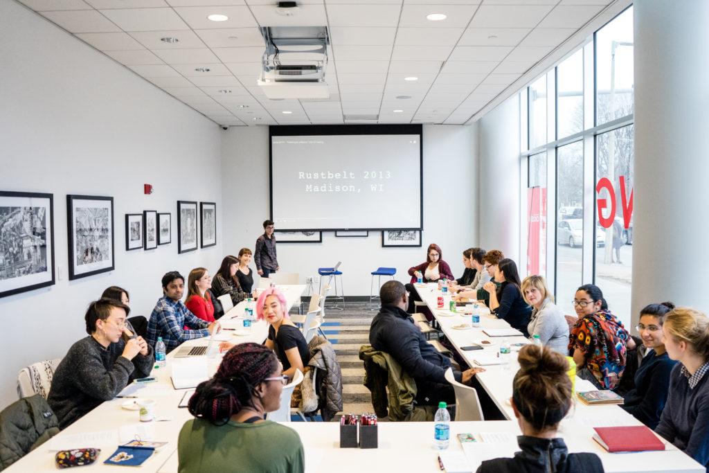 Northeastern students and members of the nearby community gathered at Northeastern Crossing Friday for a workshop on slam poetry that was built around self-care and stress relief./Photo by Lauren Scornavacca