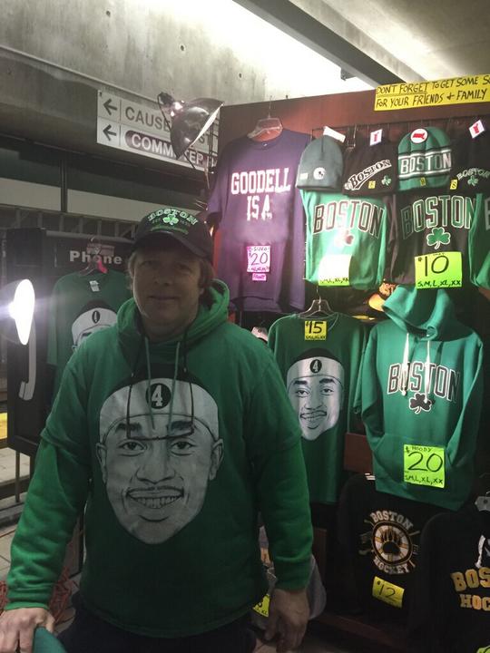 Ross Henderson sells assorted Boston sports merchandise in North Station / Photo by Brian Fields