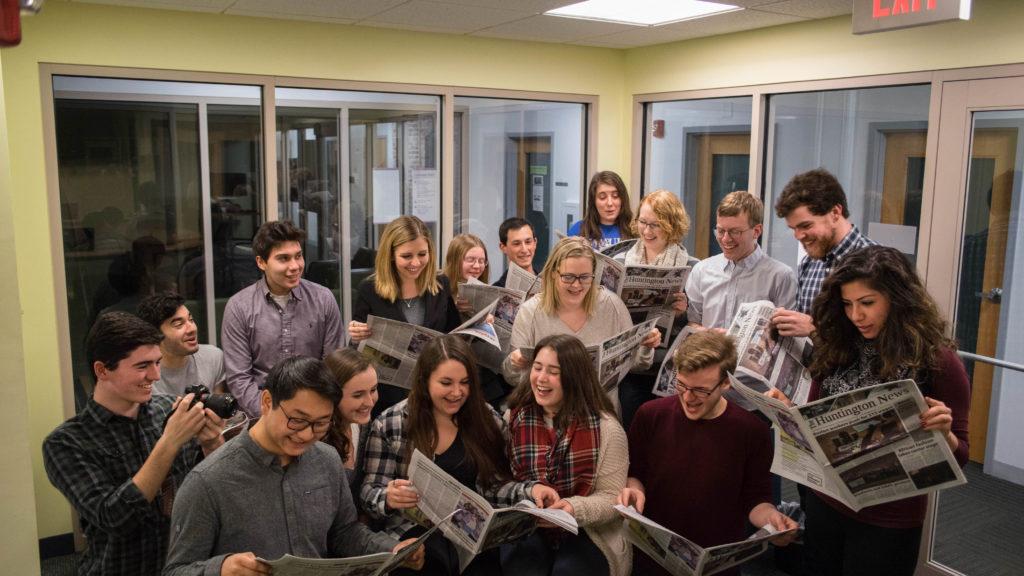 The+staff+of+The+News+sits+in+a+group%2C+proud+of+the+newspaper+they+produce+each+week.+%2F+Photo+by+Alex+Melagrano