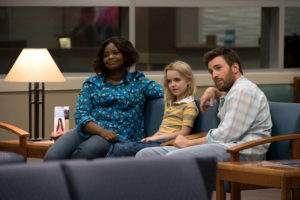 Octavia Spencer as Roberta Taylor, McKenna Grace as Mary Adler and Chris Evans as Frank Adler in the film