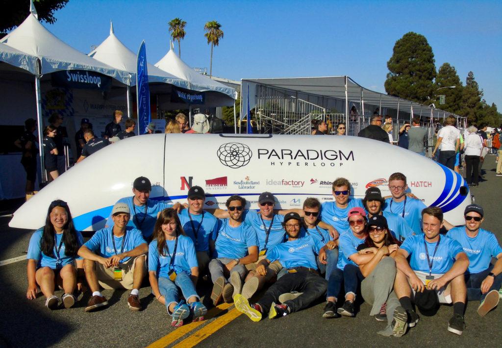 Northeasterns+hyperloop+team%2C+Paradigm%2C+poses+with+their+pod+at+Elon+Musks+SpaceX+Hyperloop+Pod+Competition.++%2F+Photo+courtesy+of+Benjamin+Lippolis