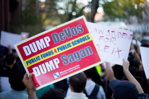 Students protest Betsy DeVos at Harvard