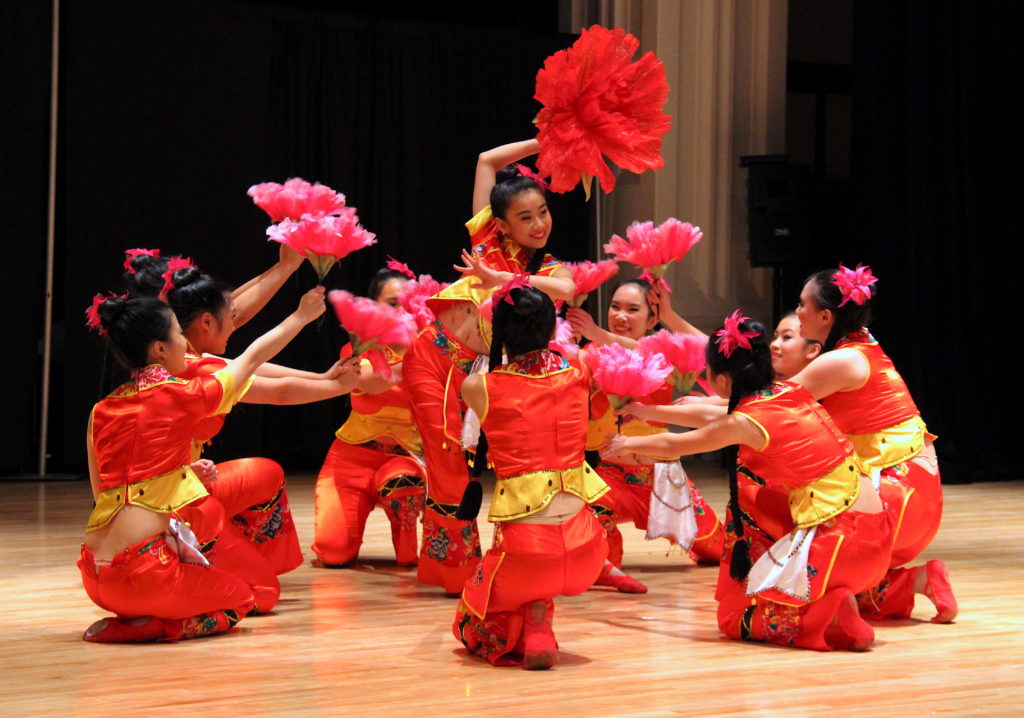 Vibrant dancers demonstrate the joys of the Chinese New Year in Among the Flowers. / Photo by Kiana Jones