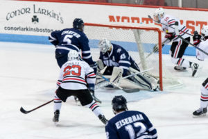 Men’s hockey pulls 8-0 victory on senior night
