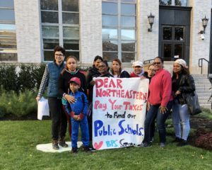 Protest asks NU to make voluntary payments