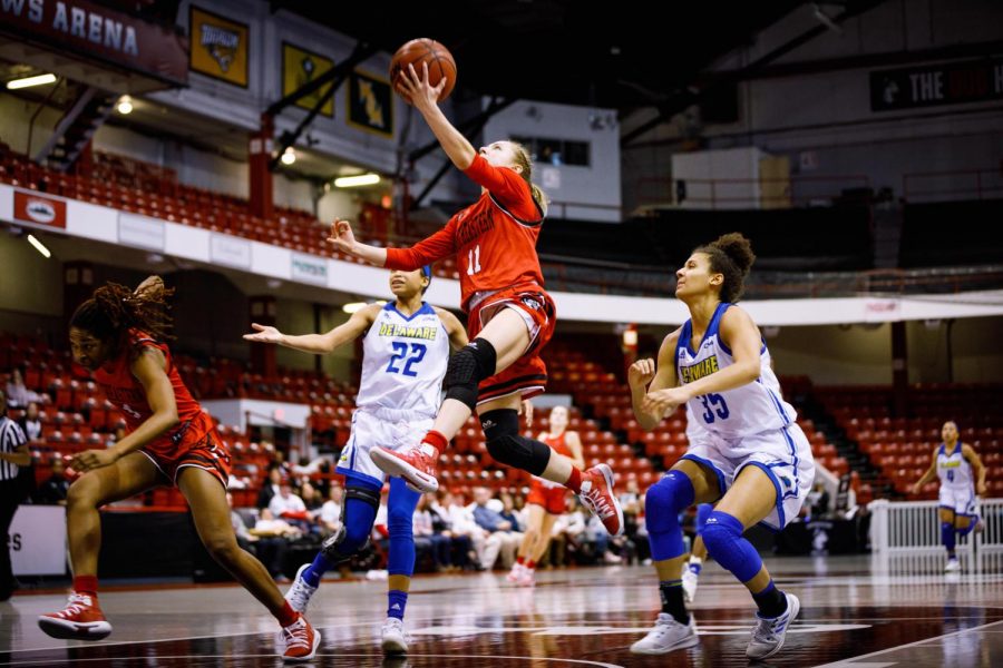 Sophomore guard Stella Clark goes up for a lay-up in the paint in a prior game against Delaware.
