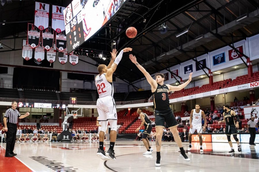 Redshirt junior guard Donnell Gresham Jr. shoots a three-pointer during a prior game against Charleston.