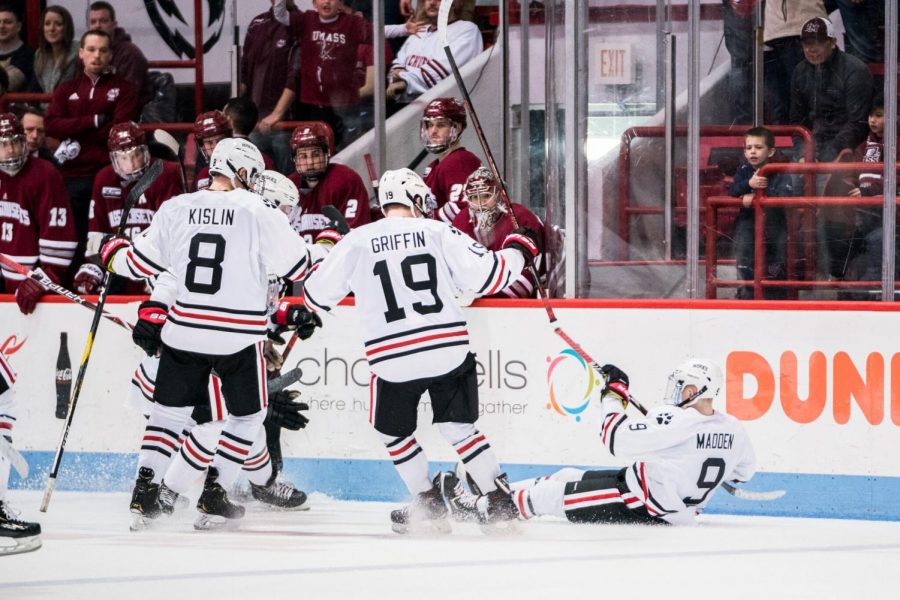 Freshman forward Tyler Madden celebrates scoring the winning goal in overtime against No. 1 UMass. 