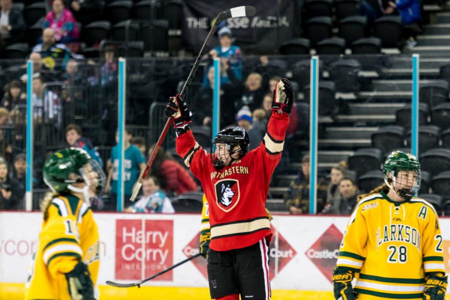 The Huskies travelled to Belfast, Northern Ireland to play Clarkson in Friendship Series, the first NCAA women’s hockey games abroad. Senior forward Kasidy Anderson, 37, celebrates after one of her two goals in Belfast against Clarkson University.