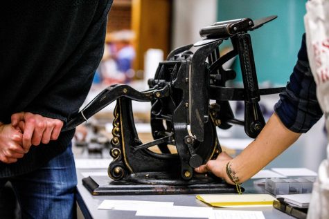 Printing press from 1896 installed in Holmes Hall
