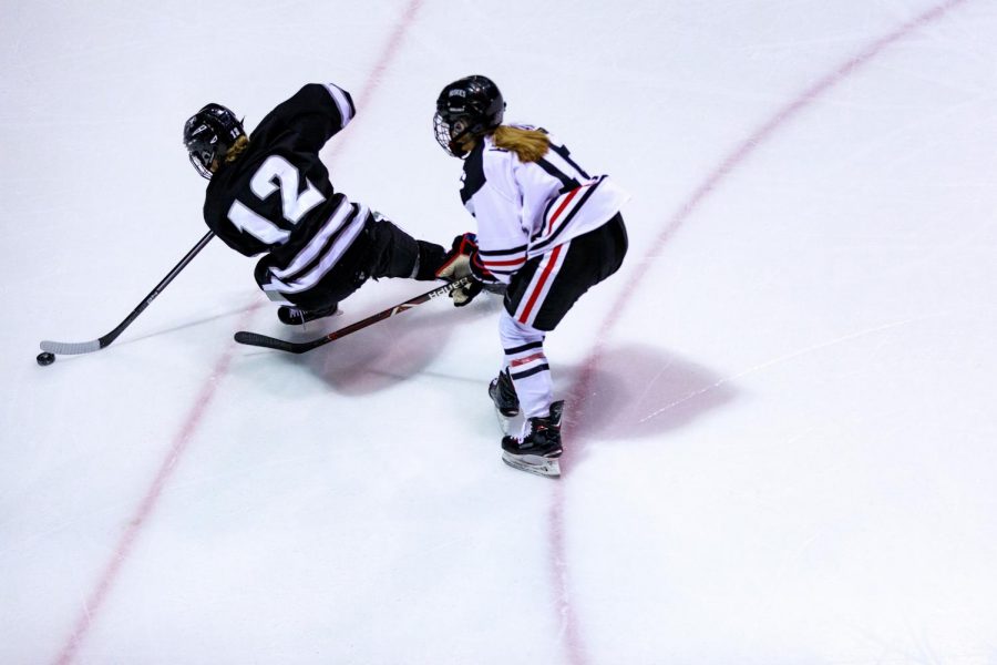 Junior forward Matti Hartman chases a Providence defender in a prior game.