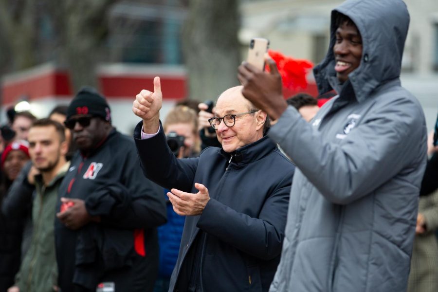 President Joseph E. Aoun shows his support for the mens basketball team.