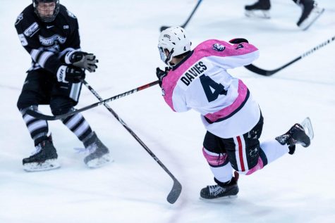 After a lifetime on the ice, Davies is a leader at NU