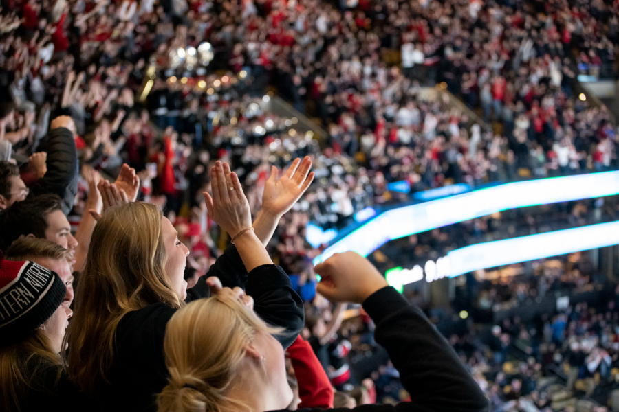 The DogHouse cheers on the mens hockey team at TD Garden Feb. 11 in the final of the Beanpot.