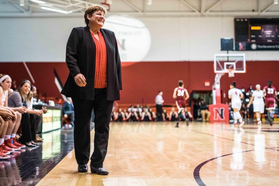 Head coach Kelly Cole roams the sidelines during a home game. Cole is in her fifth season as NU head coach.