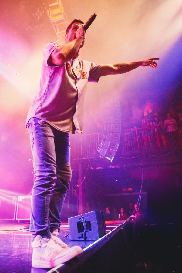 Pop-country artist Walker Hayes fires up the crowd from the edge of the House of Blues stage.