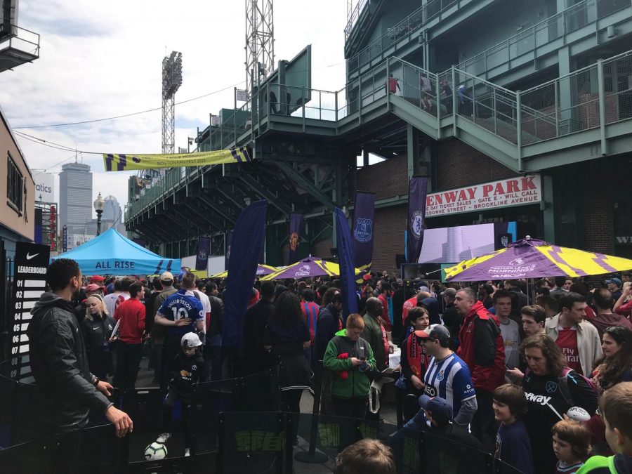 Premier League fans mill about Fenway at NBC Sports' Premier League Fan Festival.