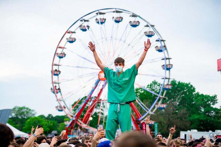 A fan stands above the crowd at Boston Calling 2019 during Sheck Wes’ set in the afternoon.