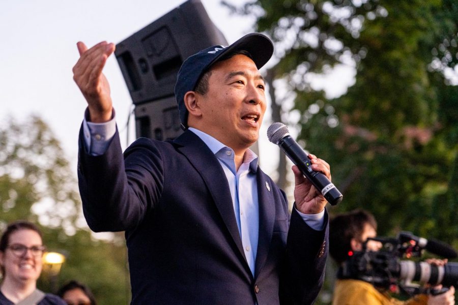 Democratic presidential candidate Andrew Yang speaks to the crowd gathered for his campaign rally at Cambridge Common Monday night. 