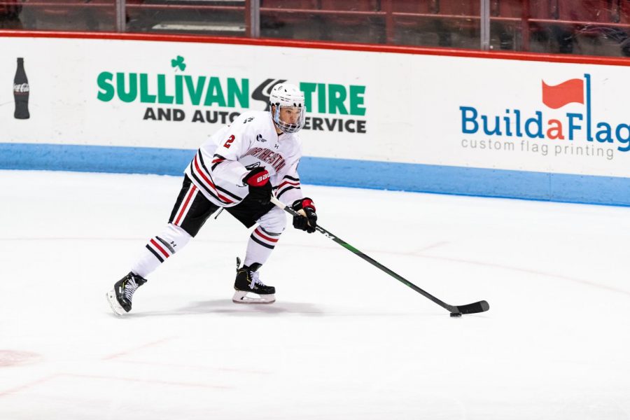 Sophomore defender Jordan Harris handles the puck in a game earlier this season versus Holy Cross. 