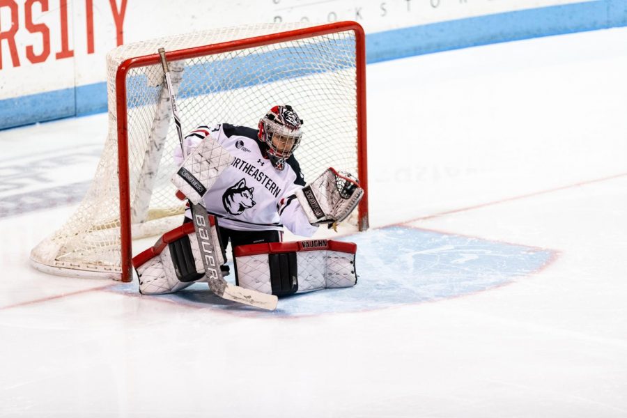 NU goaltender Aerin Frankel makes a save in a game last season versus Holy Cross.