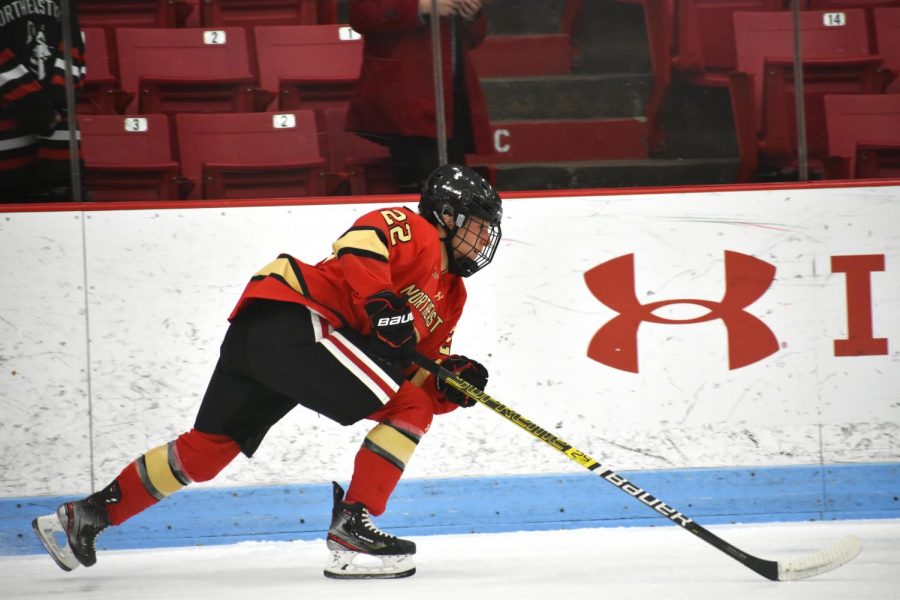 Skylar Fontaine, who potted NU's second goal, drives down the ice.