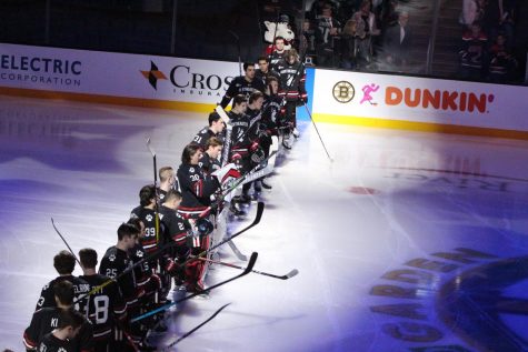 Men's hockey standing for the national anthem during this year's Beanpot.