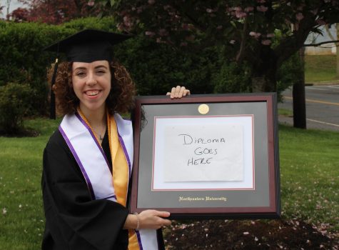 Angela Bersani poses for graduation photos in her yard on May 1