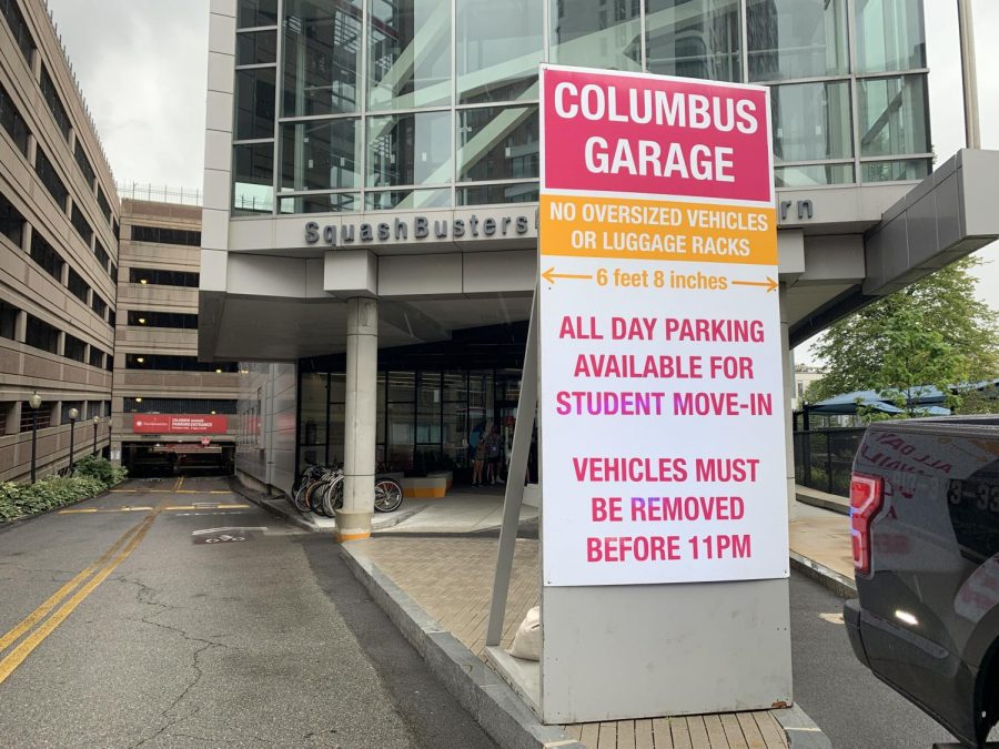 A move-in parking sign in front of Columbus Garage.
