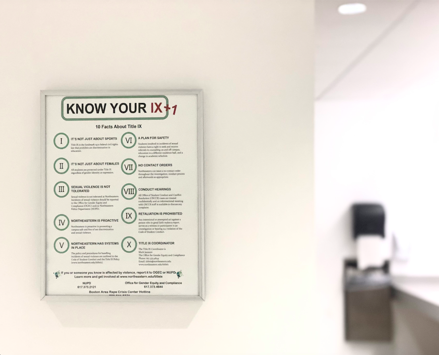 Northeastern displays 10 facts about Title IX in many restrooms around campus.