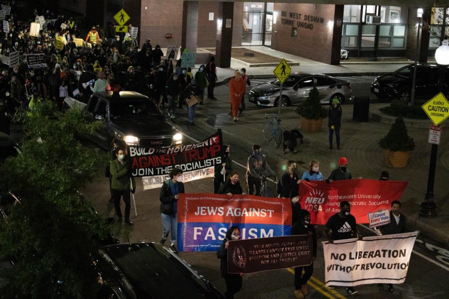 Protestors amassed in Roxburys Nubian Square on Wednesday evening to demand that all votes in the 2020 presidential election be counted. Many denounced the American election system, and they urged others to not be complacent. The rally began with speeches before marching to Copley Square later in the evening. 