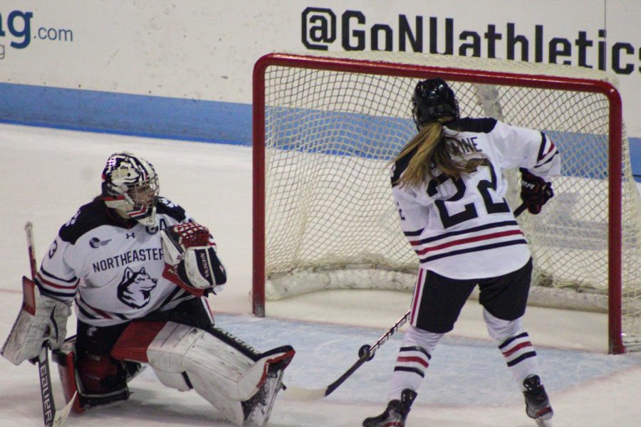 Senior goaltender Aerin Frankel and defender Skylar Fontaine watch as Boston College scores in the Huskies 2-1 loss to the Eagles. 