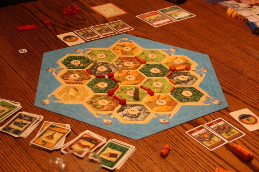 Game Night by Randy Son Of Robert is licensed with CC BY 2.0. To view a copy of this license, visit https://creativecommons.org/licenses/by/2.0/

Settlers of Catan is one of many party games that can be played virtually