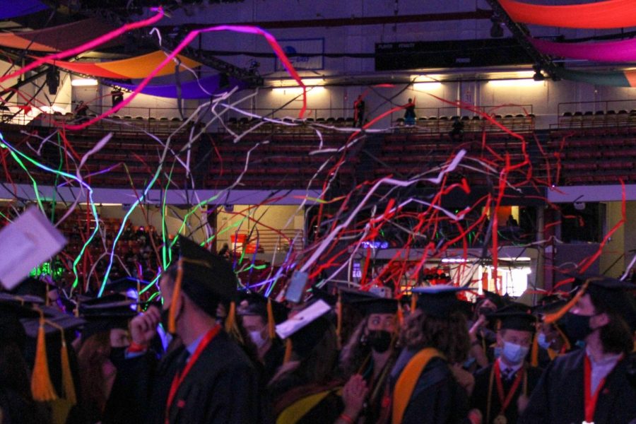 Streamers shot from the sides of the arena and rained down on the graduates at the end of both ceremonies. 