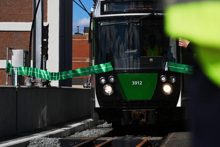 A new Green Line trolley cut the ceremonial ribbon as it entered Lechmere station from Union Square, transporting local officials into the opening ceremony for the opening of the Green Line Extension Monday afternoon. Photo credit Avery Bleichfeld. 