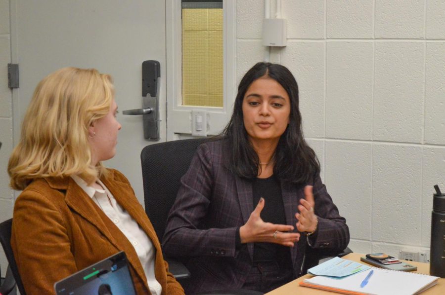 At the March 10 debate prior to elections, presidential candidate Rhea Tipnis (right) and executive vice presidential candidate Abigail Sodergren (left) presented their platform as the New Horizons slate. 