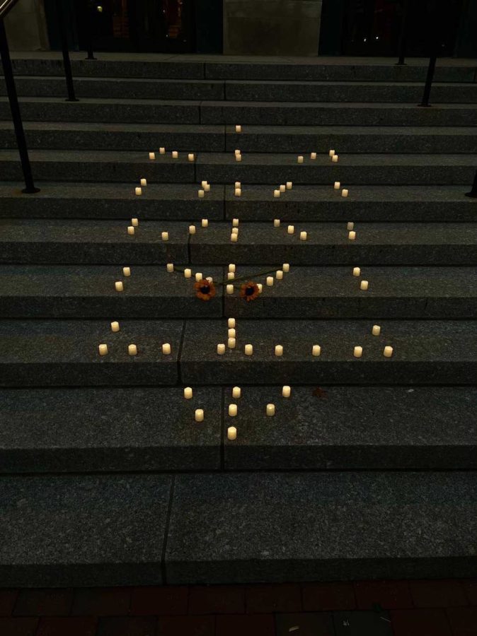 Northeasterns Ukrainian Culture Club hosted a vigil April 7 to commemorate the lives lost in the war. At the opening of the vigil, candles were arranged at the Krentzman Quad in the form of the tryzub, Ukraines coat of arms. Photo courtesy of Terenia Hankewycz.