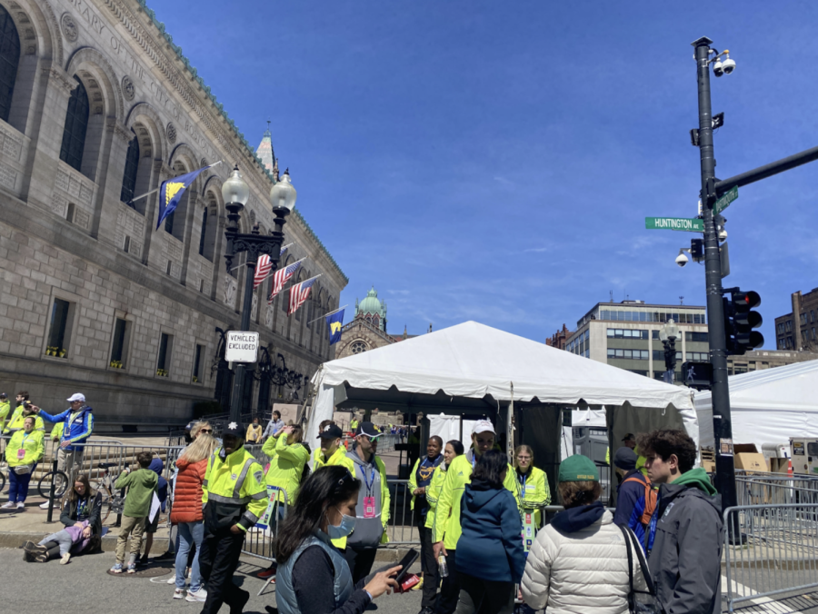 Volunteers work at the corner of Dartmouth and Huntington streets on the morning of the 126th Boston Marathon. Photo by Kathryn Manning.