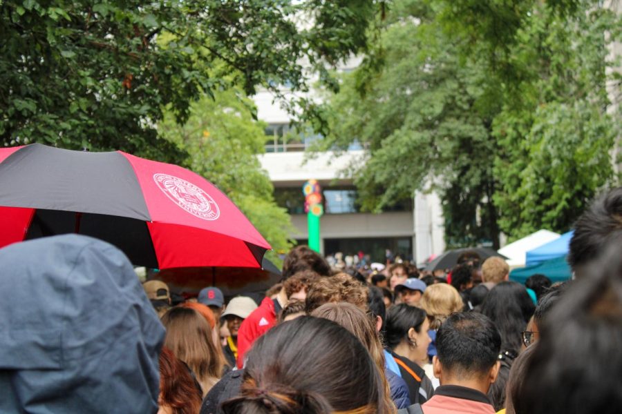 A sea of umbrellas and rain coats accompanied students through Fall Fest. Clubs were set up all across campus, concentrated on Centennial Common, Krentzman Quadrangle, near Snell Library and by West Village.  