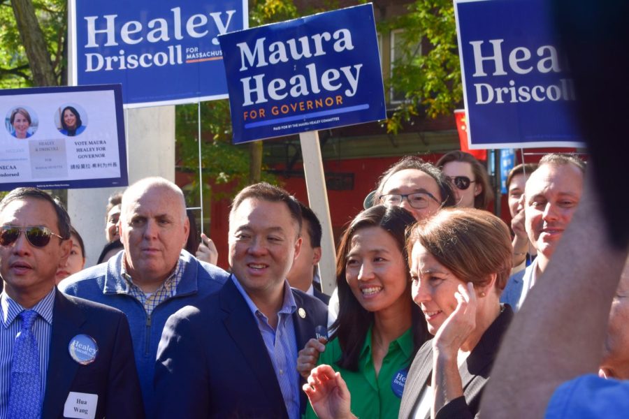 Boston City Council President, Ed Flynn, Connecticut attorney general, William Tong and Boston Mayor Michelle Wu stand with Healey as she speaks to a crowd. Healey visited Chinatown Oct. 15 to canvass for her campaign.