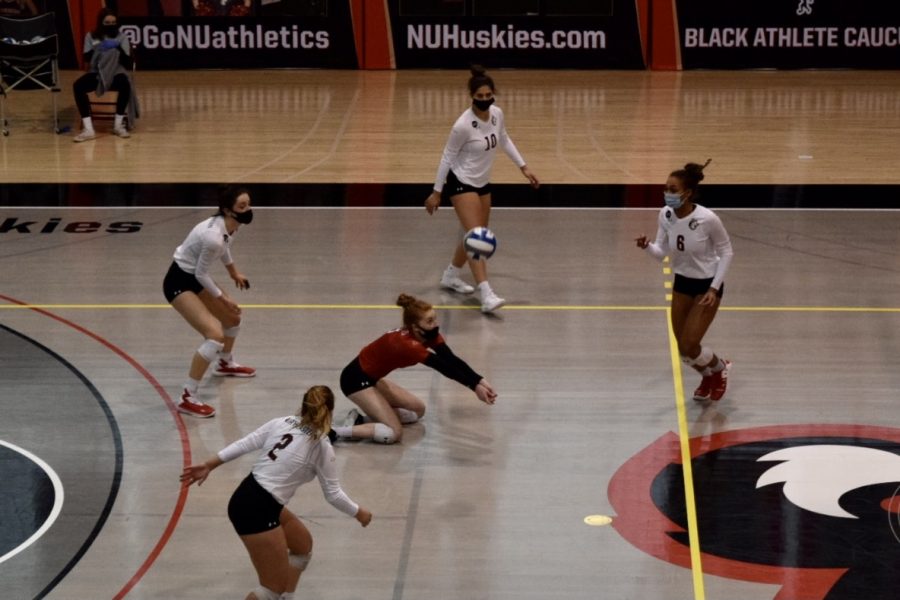 Senior libero and defensive specialist Kayla Martin playing against the University of Rhode Island in 2021. 